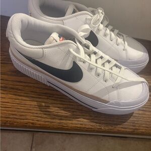 Nike Women’s White and Black Sneakers